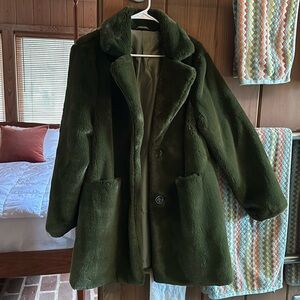 Beautiful, like new, smooth, fur-like coat. Worn once.